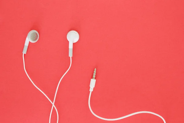 Earbuds Earphones Red Background — Stock Photo, Image