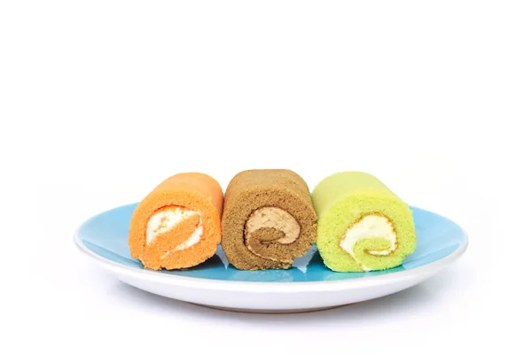 Grüne Schokolade Orange Kuchenrolle Auf Blauem Auf Weißem Hintergrund — Stockfoto