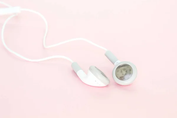 Fülhallgató Vagy Fülhallgató Pink Háttér — Stock Fotó