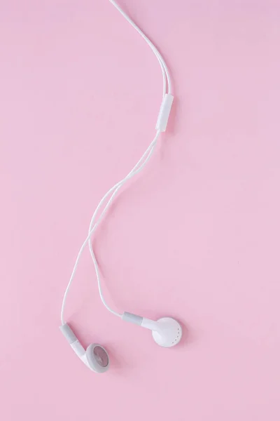 Ακουστικά Ψείρες Ακουστικά Ροζ Φόντο — Φωτογραφία Αρχείου