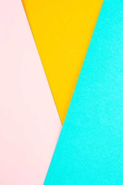 paper color yellow, pink and green abstract background.