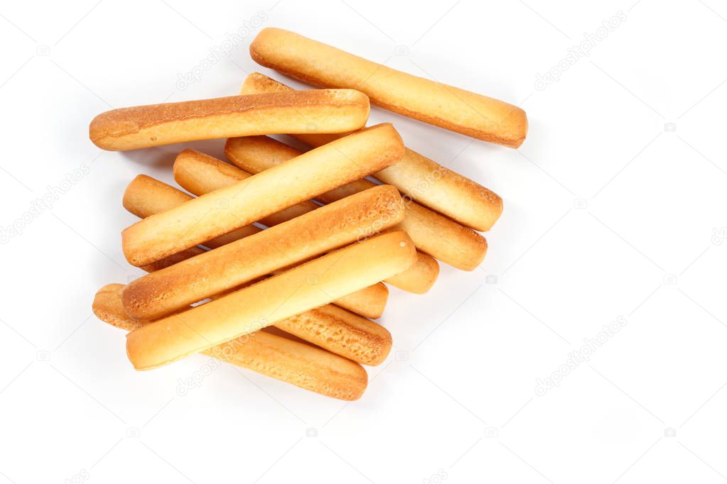 bread sticks top view on white background.