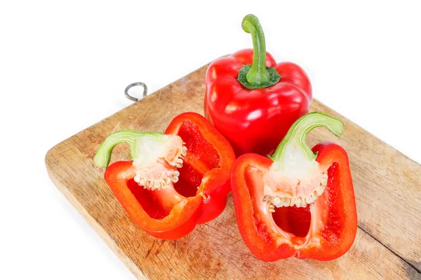 Rode Paprika Snij Doormidden Houten Cutting Board Achtergrond — Stockfoto