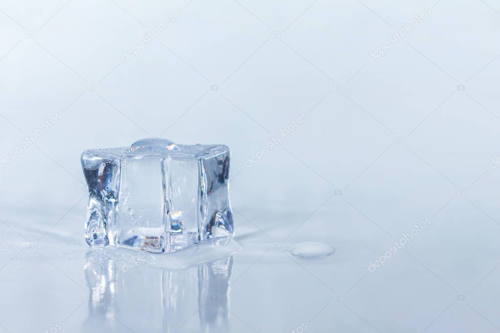 One ice cubes on white background.