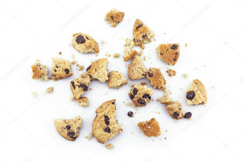 Cookies chocolate broken into pieces on white background.