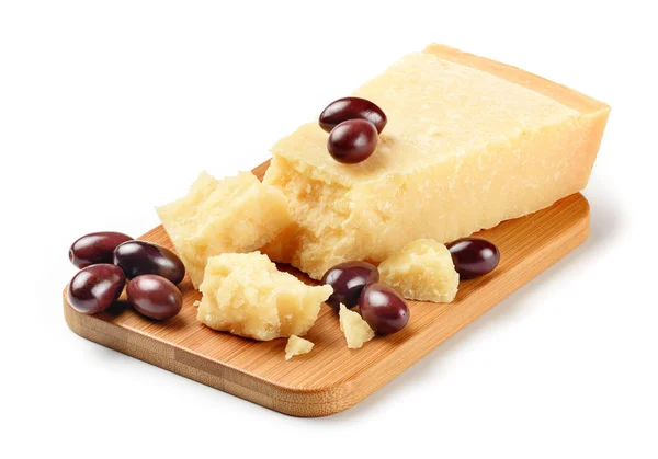 Parmesan with taggiasca olives on wooden table — Stock Photo, Image