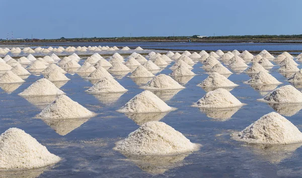 Raw salt or pile of salt from sea water in evaporation; ponds at Phetchaburi province,Thailand