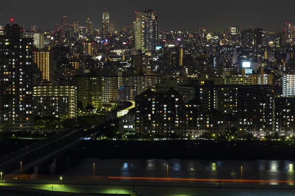 Tóquio cidade e horizonte com luz noturna — Fotografia de Stock
