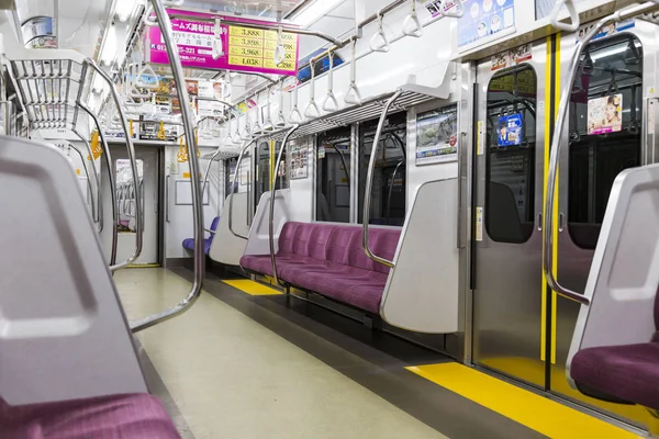 Passagiersitze in japanischer U-Bahn mit niemandem — Stockfoto