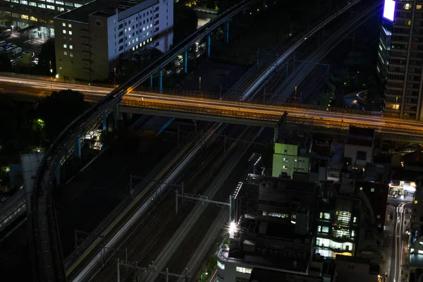 東京の街並み 夜の光 都市景観 高層ビルの日本鉄道 — ストック写真