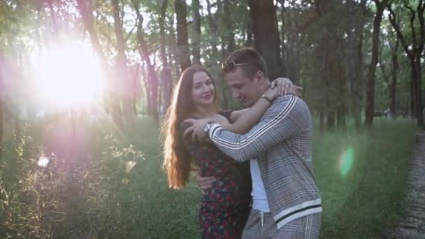 Happy man and woman have fun together in Park during day. concept relationship — Stock Video