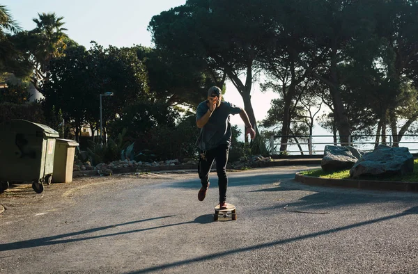 Man Casual Clothing Practicing His Long Board Lonely Street Sunset — Stock Photo, Image