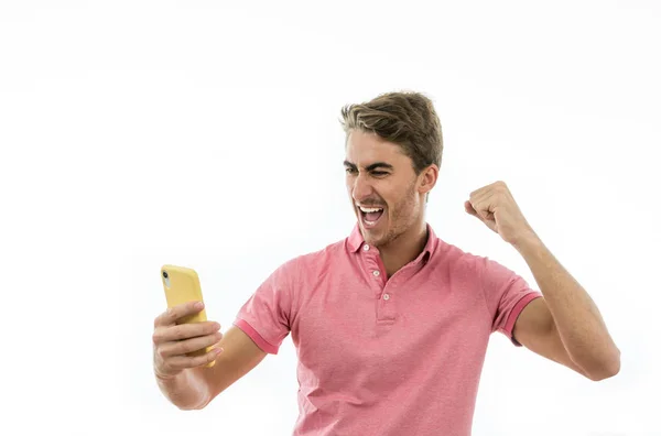 Man gör satsningar på mobiltelefon — Stockfoto