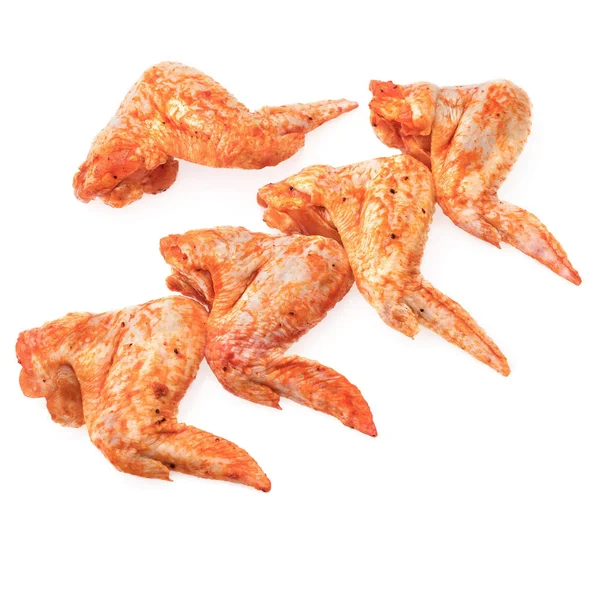 Baharatlarla Marine edilmiş tavuk. beyaz bir arka plan üzerinde izole.