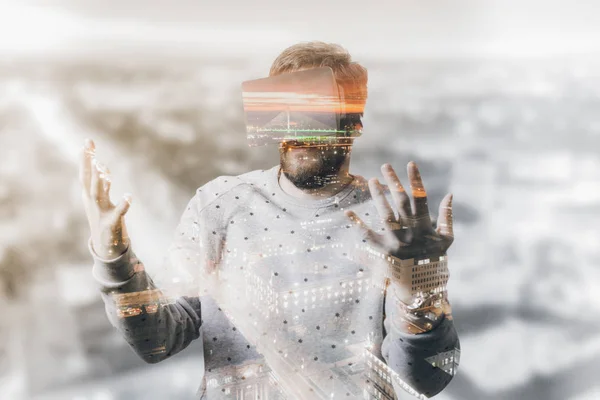 Double exposure of man and city