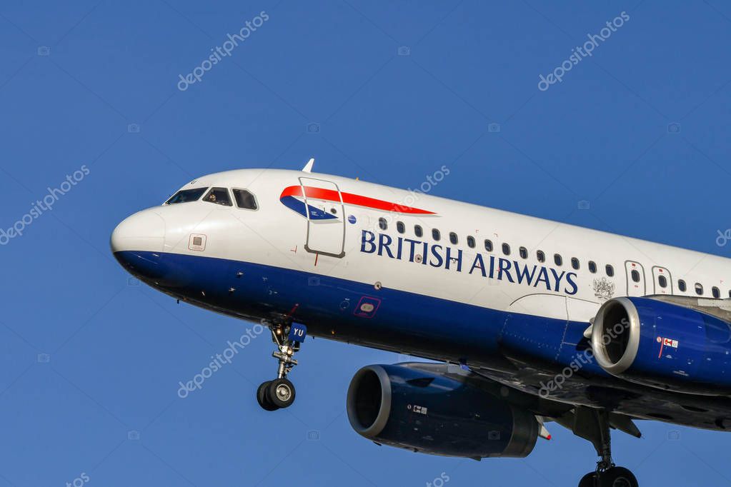 LONDON, ENGLAND - NOVEMBER 2018: Close up view of a British Airways Airbus A320 short-haul airliner arriving at London Heathrow Airport.