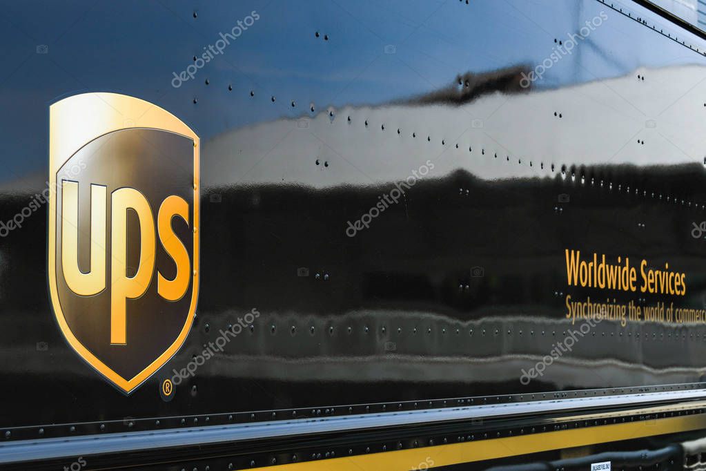 SEATTLE, WA, USA - JUNE 2018: Close up of the logo on the side of a UPS delivery van parked on a street in Seattle city centre.