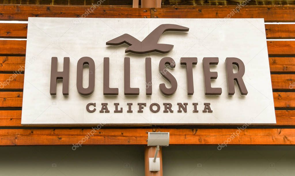 SEATTLE, WA, USA - JUNE 2018: Close up view of a sign outside the Hollister factory store at the Premium Outlets shopping mall in Tulalip near Seattle.
