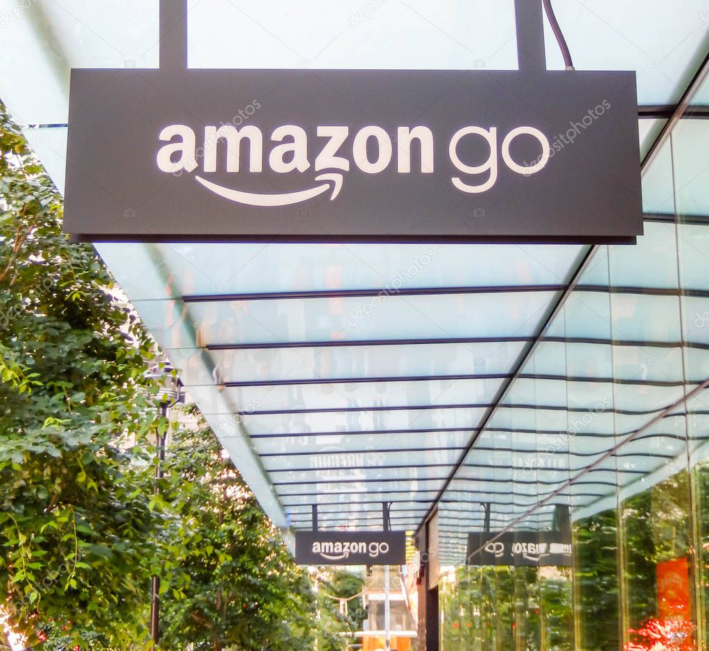 SEATTLE, WA, USA - JUNE 2018: Signs outside the Amazon Go store in Seattle city centre.