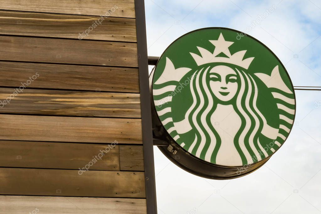SEATTLE, WA, USA - JUNE 2018: Close up view of the sign outside the Starbucks Coffee shop at the Premium Outlets shopping mall near Seattle.