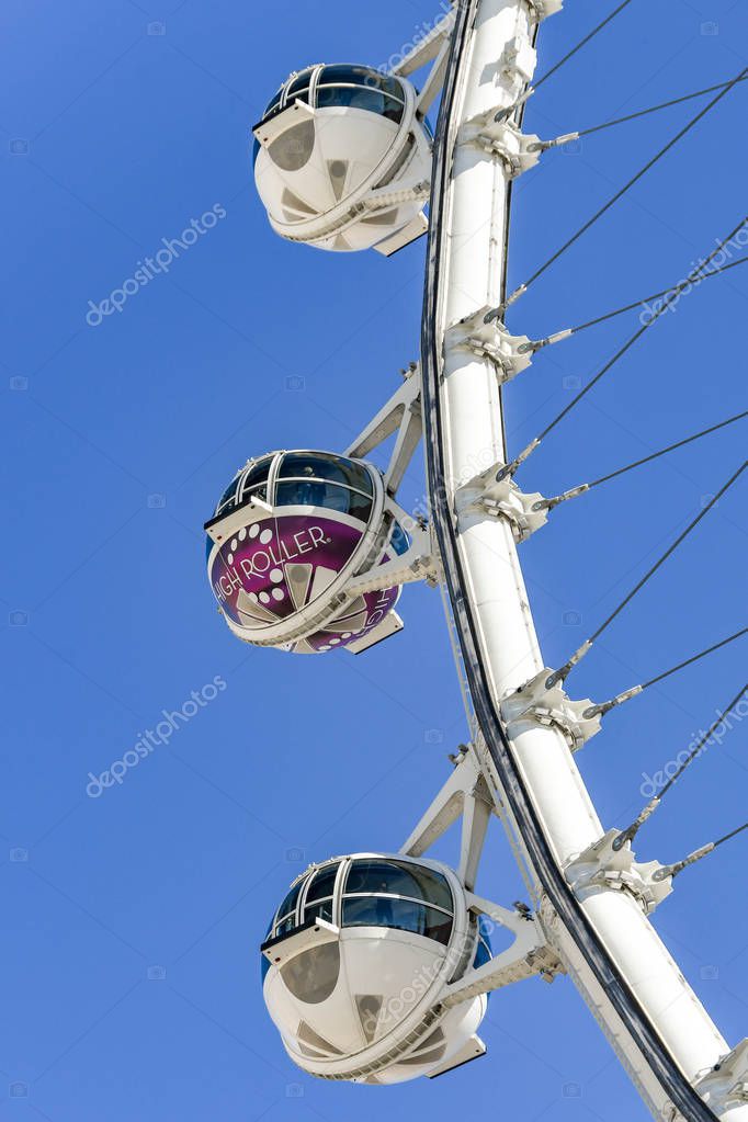 LAS VEGAS, NEVADA - FEBRUARY 2019: Close up view of capsules on the High Roller giant wheel ride against a blue sky. It is a landmark and major tourist attraction in Las Vegas.