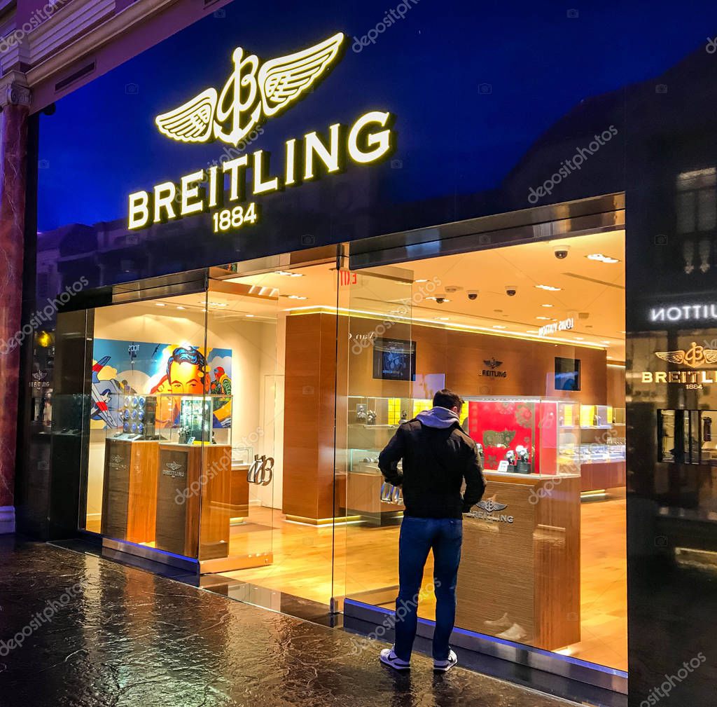 LAS VEGAS, NV, USA - FEBRUARY 2019: Person looking in the window of the Breitling store in the shopping mall in Caesars Palace, Las Vegas.