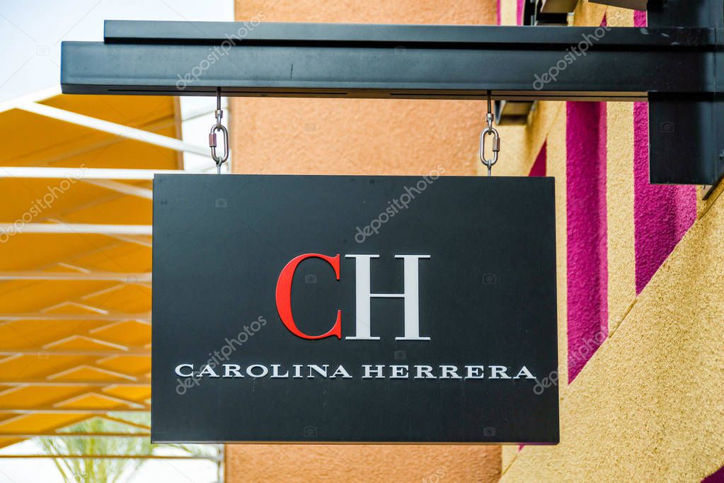 LAS VEGAS, NV, USA - FEBRUARY 2019: Sign above the entrance to the Carolina Herrera store in the Simon Premium Outlets north in Las Vegas.
