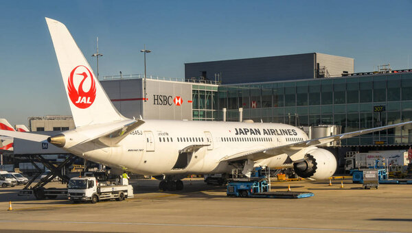 LONDON HEATHROW AIRPORT - JUNE 2018: Japan Airlines Boeing 787 Dreamliner parked outside Terminal 3 of London Heathrow Airport. 