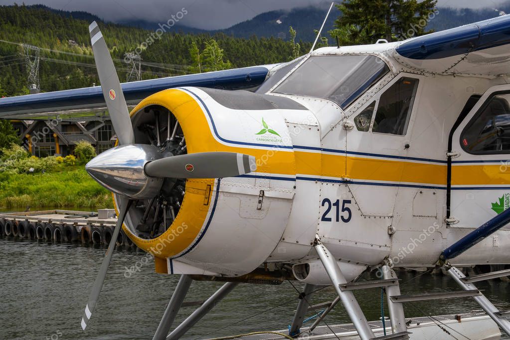 WHISTLER, BC, CANADA - JUNE 2018: Close up of a De Havilland Beaver seaplane operated by Harbour Air tied up at the seaplane terminal in Whistler.