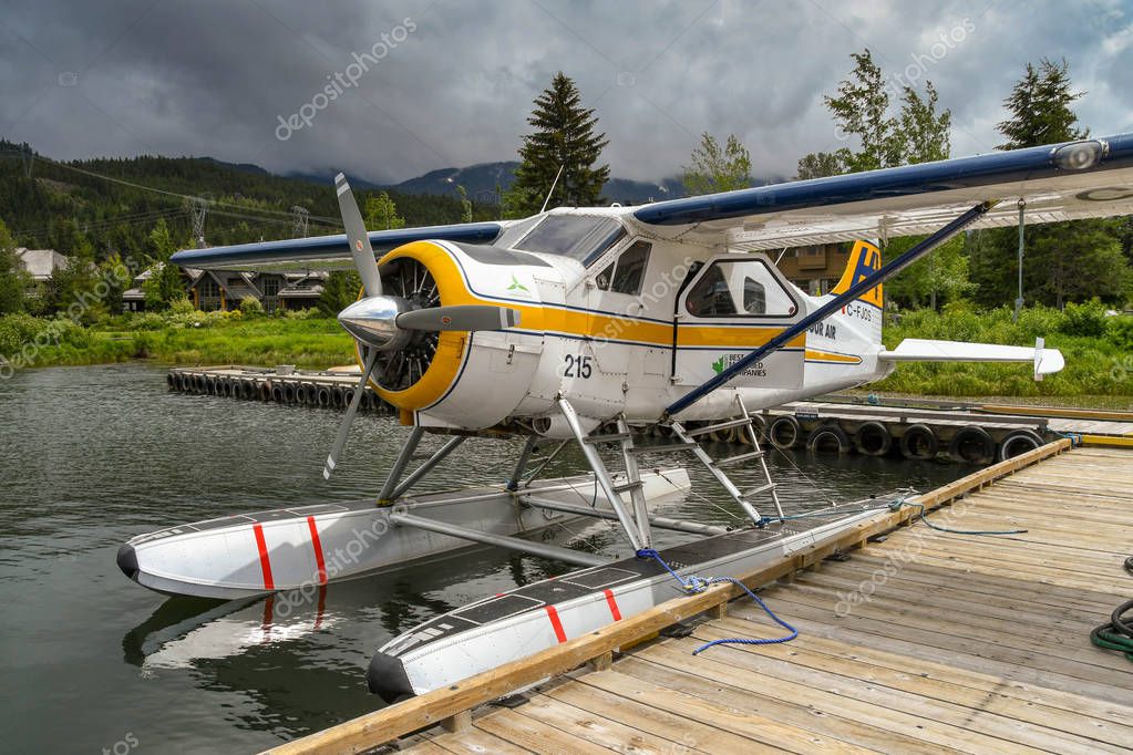 WHISTLER, BC, CANADA - JUNE 2018: De Havilland Beaver seaplane operated by Harbour Air tied up at the seaplane terminal in Whistler.