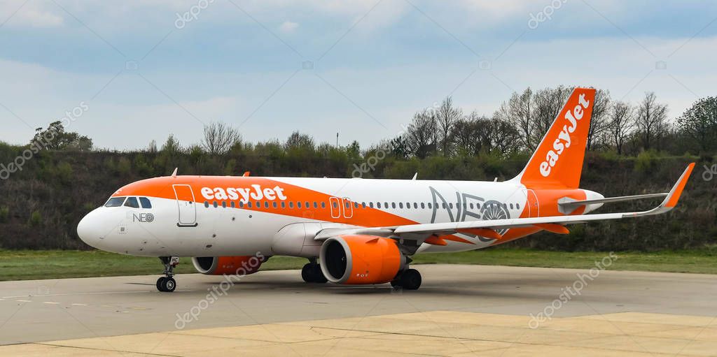 LONDON GATWICK AIRPORT, ENGLAND - APRIL 2019: New Airbus A320 Neo plane operated by Easyjet taxiing for take off at London Gatwick airport.