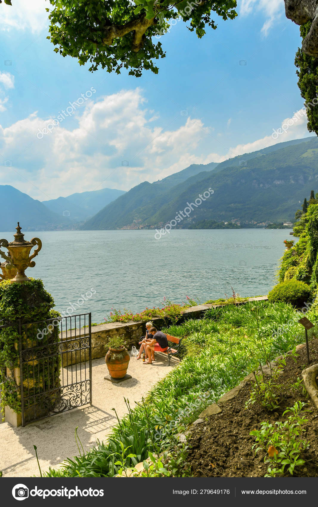 Lenno Lake Como Italy June 2019 Two People Sitting Bench Stock