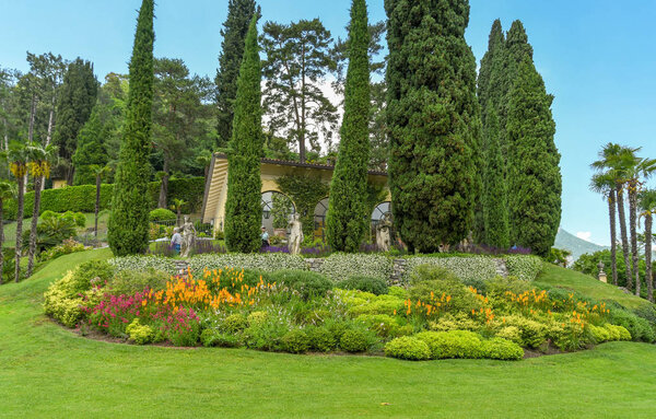 LENNO, LAKE COMO, ITALY - JUNE 2019: Landscaped garden of the Villa Balbianello in Lenno on Lake Como.