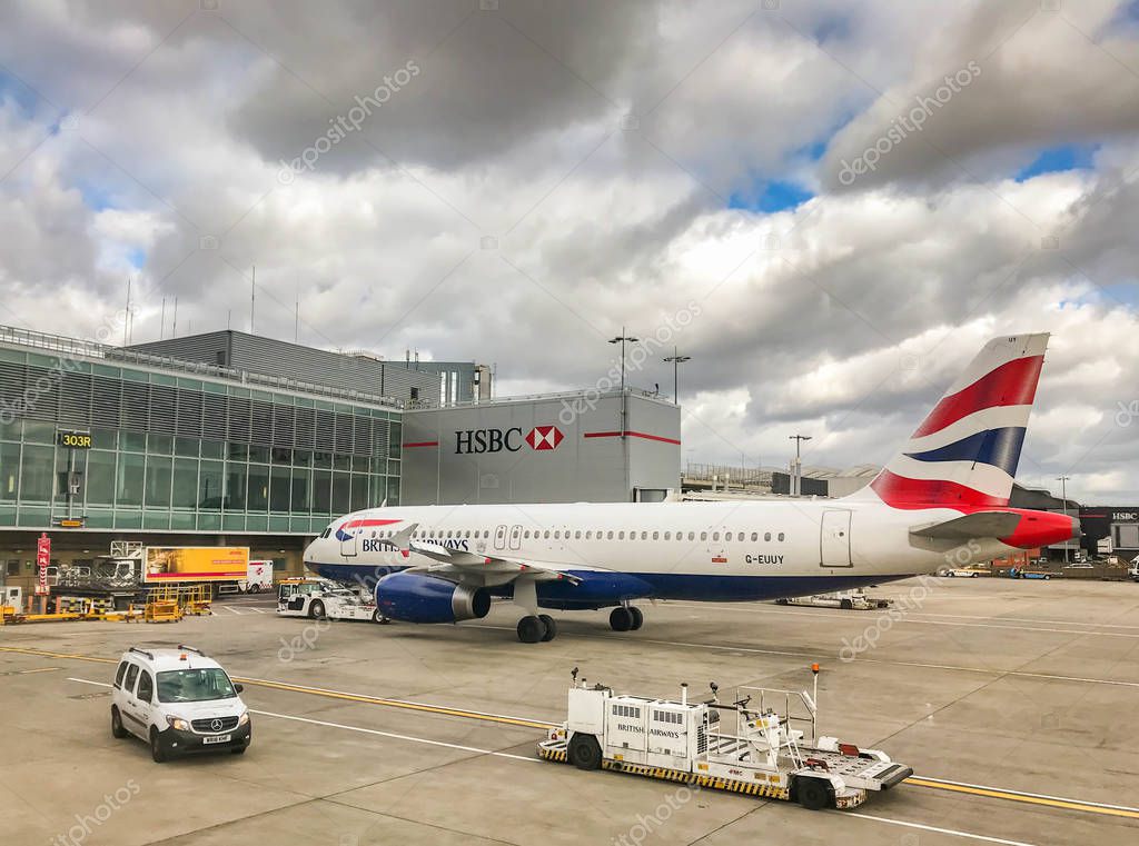 LONDO HEATHROW AIRPORT - MARCH 2019: Airbus A320 jet operated by British Airways parked on stand at Terminal 3 at London heathrow Airport.