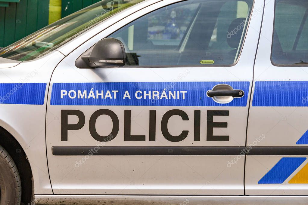 PRAGUE, CZECH REPUBLIC - JULY 2018: Close up view of the markings on the wide of a police car in Prague city centre.