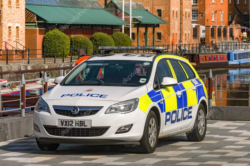 GLOCESTER, ENGLAND - SEPTEMBER 2019: Police patrol car parked in Gloucester Quays, which is the former docks area