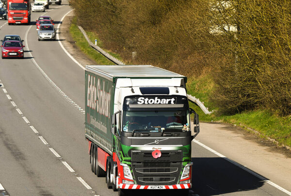 Miskin, Wales - April 2018: Landscape view of articulated lorry operated by Eddie Stobart on the M4 motorway near Cardiff