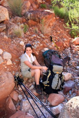 Young woman resting on the Tonto Trail in the Grand Canyon. clipart