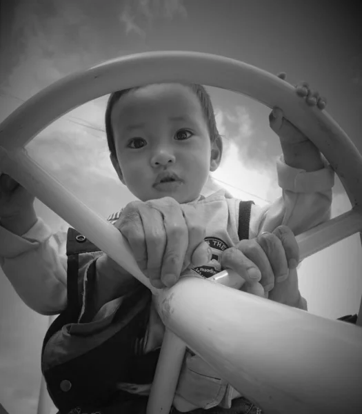 Black and white photography of asian boy