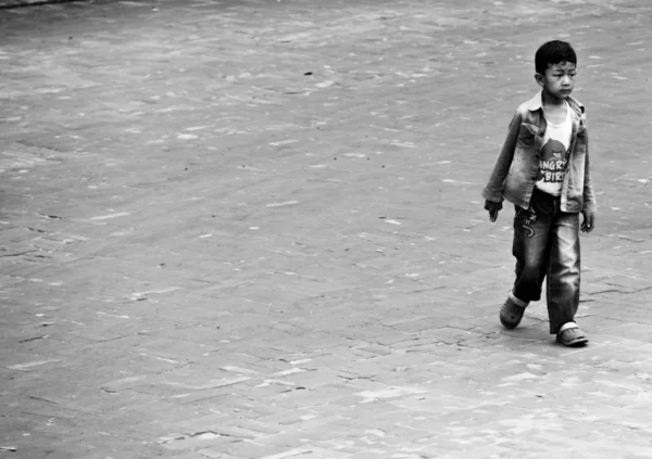 little asian boy in black and white