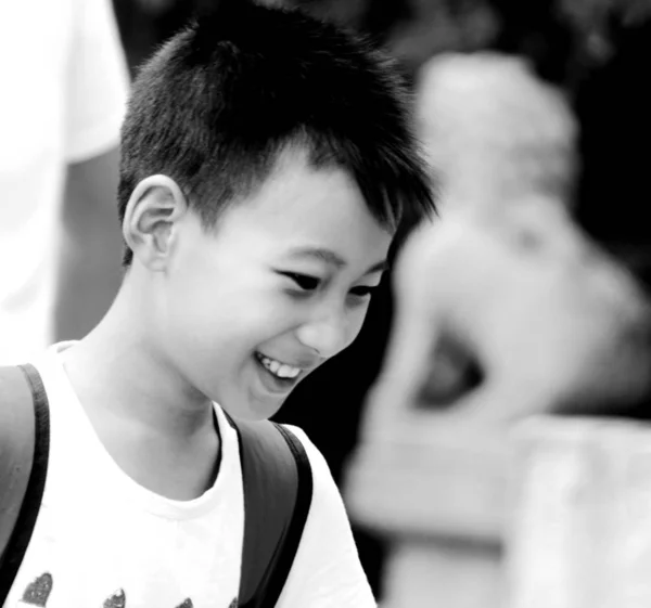 Black and white photography of asian boy