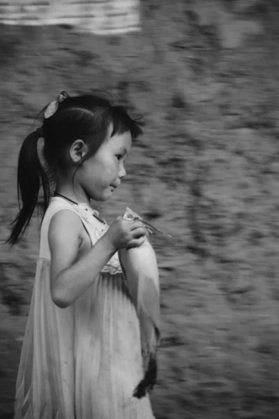 Black and white photography of asian child