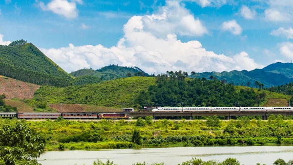 Scenic view of train passing through the mountains