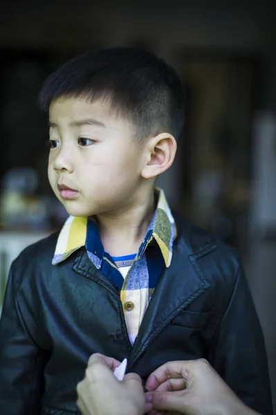 Chinese young boy in casual clothes