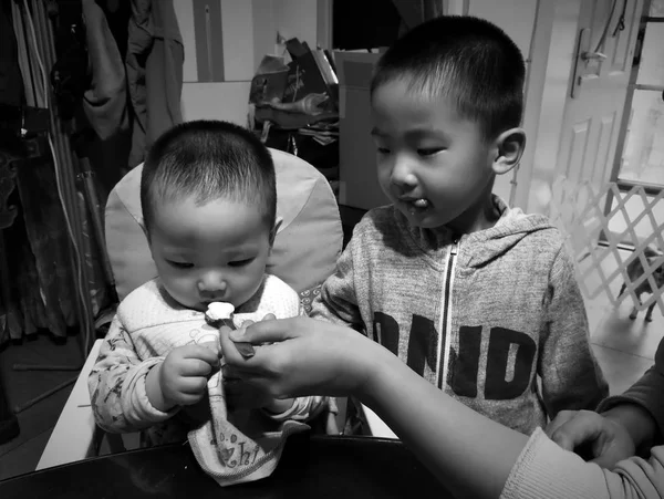 Black and white photography of asian child