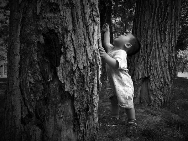 black and white photo of little asian baby boy