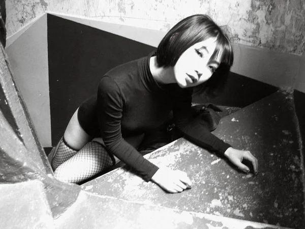 Black and white photo of asian woman