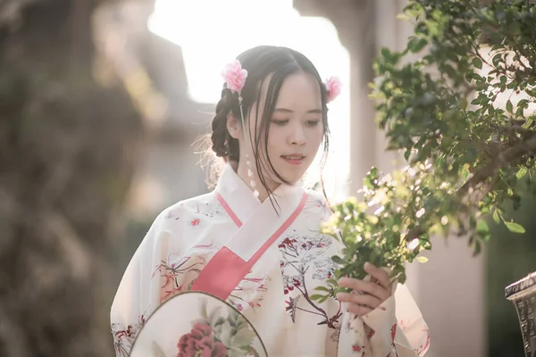 Chinese teen girl in traditional clothes