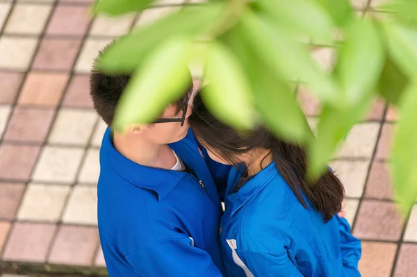 Asian couple walking together