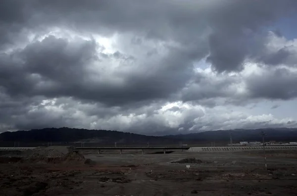 dark storm clouds in the desert